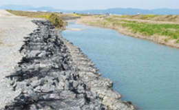 袋詰玉石の設計位置での製作による生産性向上