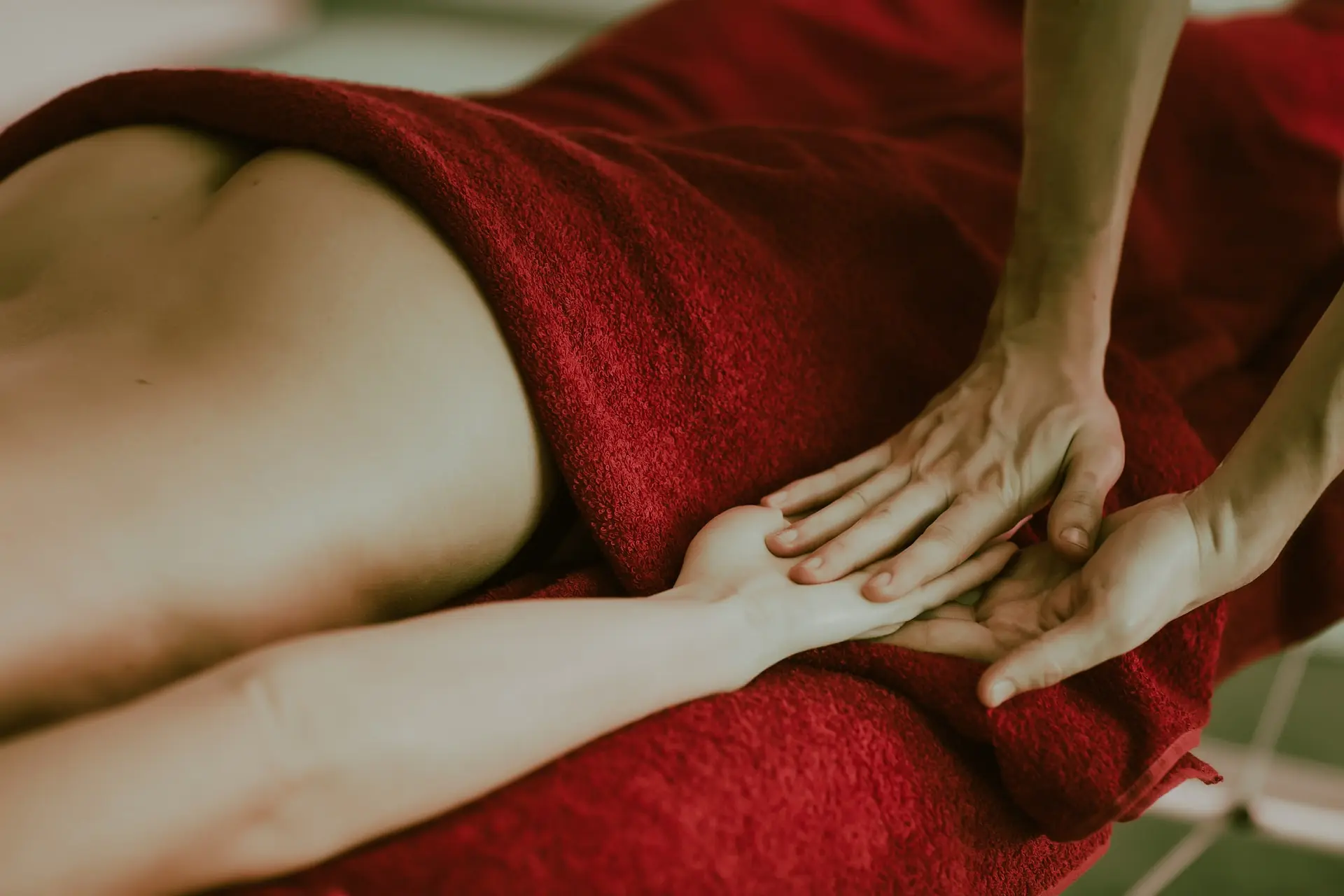 Male masseur performing a back