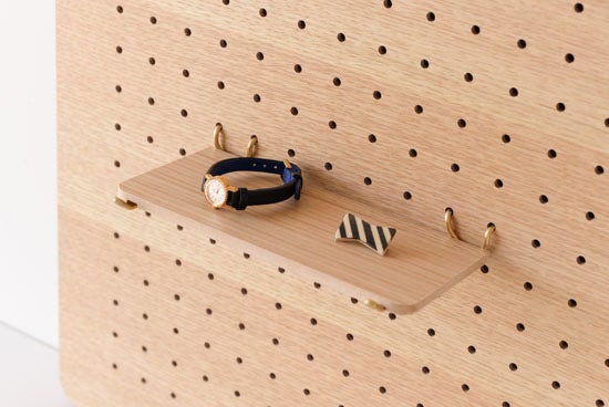 マンションリノベーション白い有孔ボードの壁があるお家中古マンションリノベで快適生活